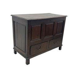 Early 18th century oak mule chest, hinged rectangular top above three recessed panels and two drawers, each fitted with brass drop handles, open interior fitted with candle box compartment, raised on square supports