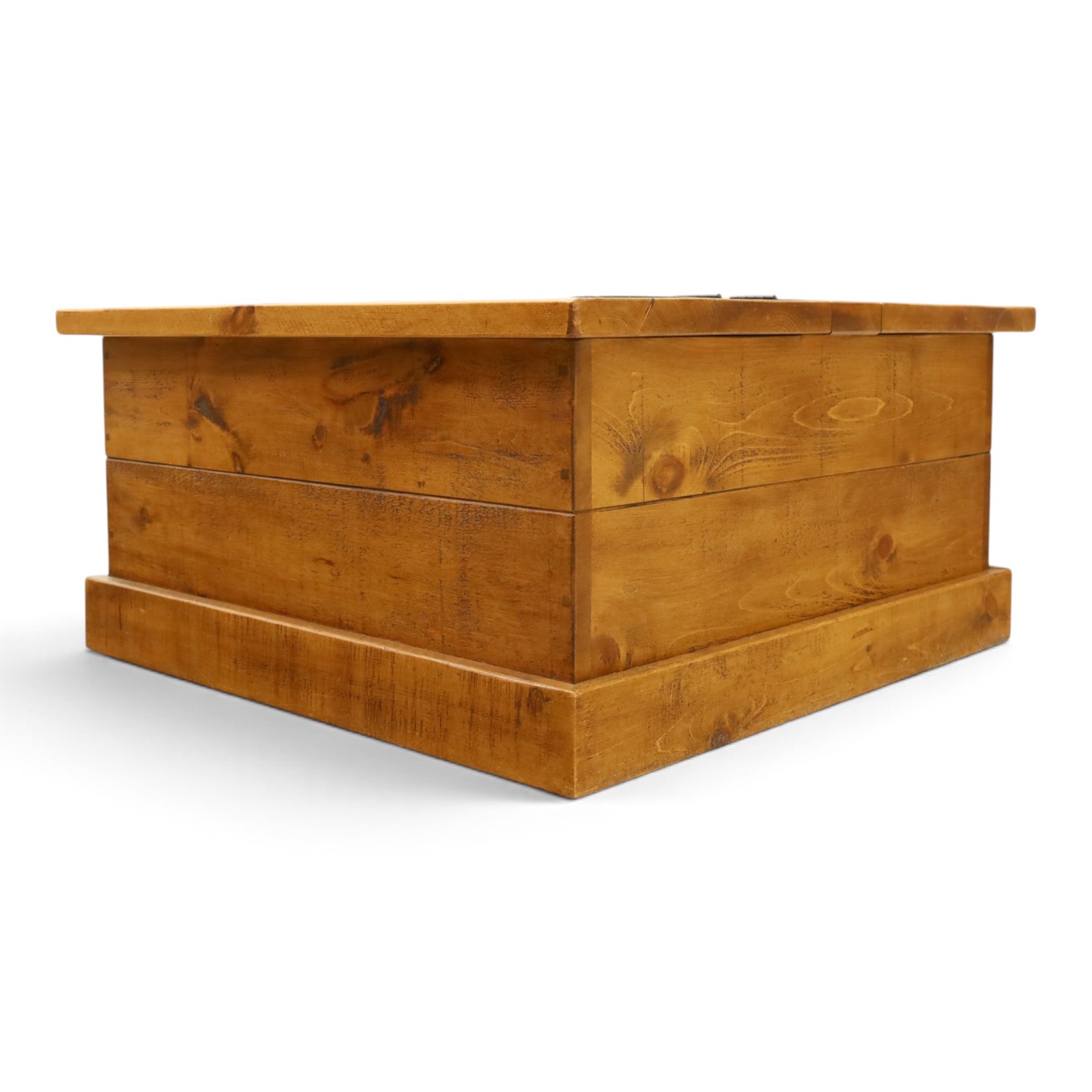 Indigo Furniture - rustic oak coffee table with double-hinged top concealing compartment, on skirted base