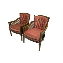Pair stained beech framed bergere armchairs, upholstered in buttoned pink fabric