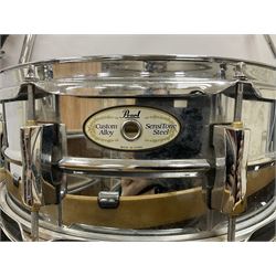 Pearl Vision SST Birch Ply shell four-piece drum kit in black comprising bass drum with foot pedal and three graduated toms; together with Pearl Custom Alloy Sensitone steel snare drum, drum and cymbal stands, microphone stand, stool and various drum sticks 