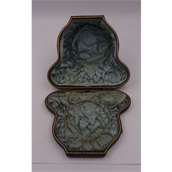 Victorian silver bowl, with embossed floral decoration and beaded rim, gilt interior and two applied shield cartouches, upon stepped circular foot, with a silver apostle spoon, with gilt bowl, both hallmarked George Unite, Birmingham 1883, bowl H5.5cm, within fitted tooled leather, silk lined case