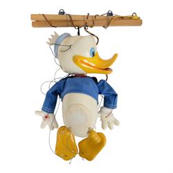 Six Pelham Puppets, comprising Walt Disney Mickey Mouse with Pluto, Donald Duck, and Goofy, Wombles Wellington, Caterpillar and Mouse all boxed, together with a Pelham Puppet Lightweight Theatre, boxed