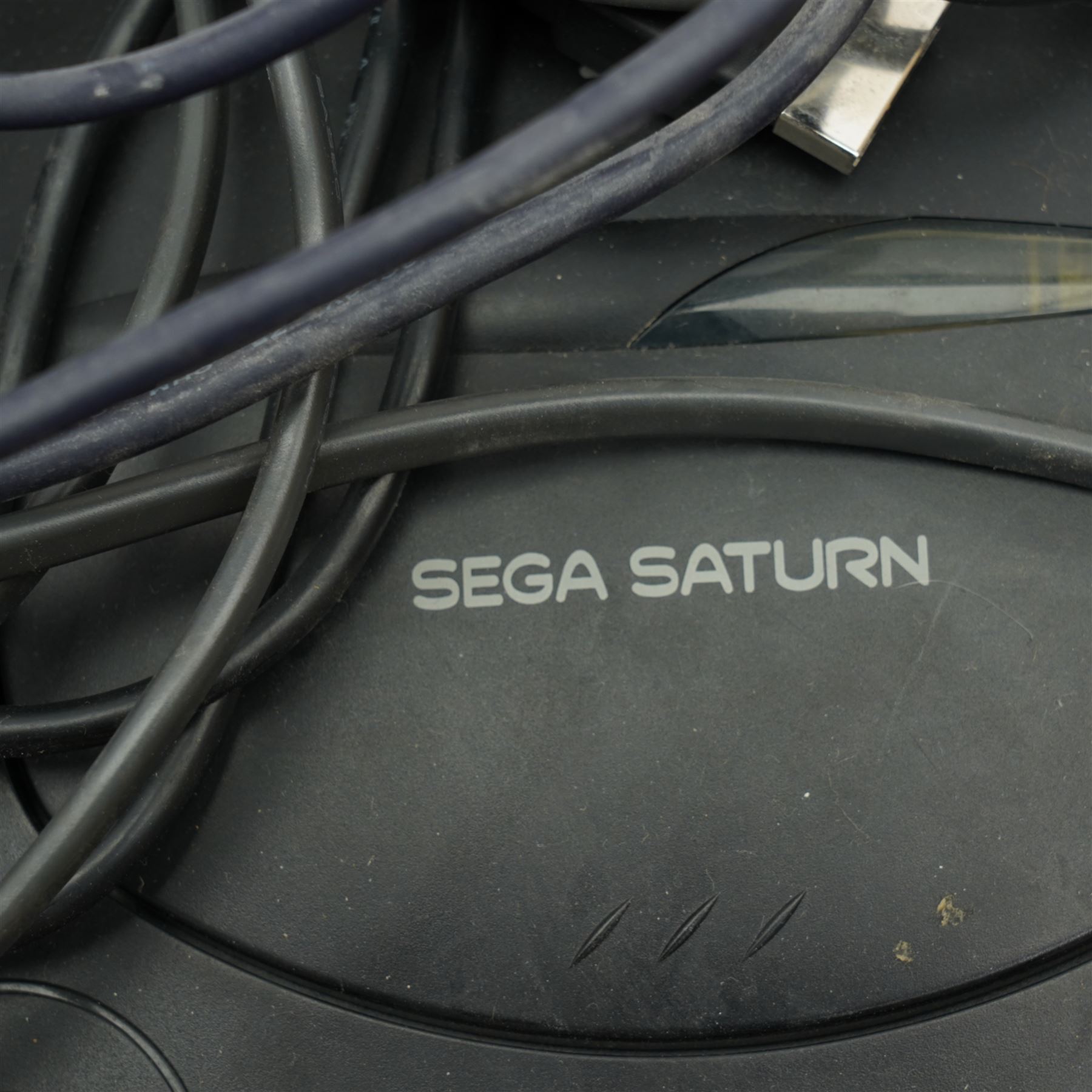 Sega Saturn games console, boxed with two games 'Daytona USA' and 'Sega Rally Championships'