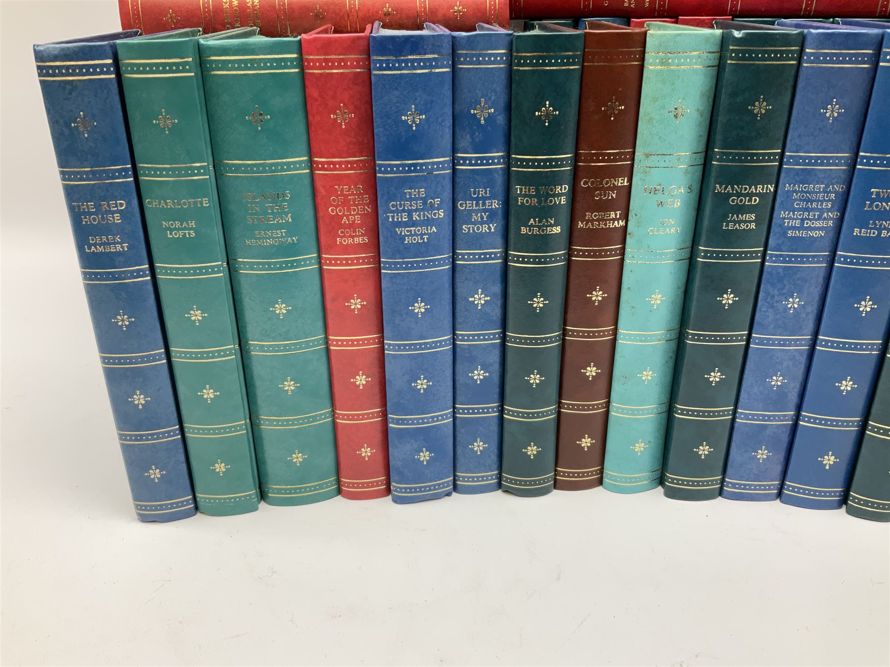 The Companion Book Club London, approximately one hundred thirty hardback novels, various titles including, Blood Sport by Dick Francis, Nemesis by Agatha Christie, The Eye of The Tiger by Wilbur Smith, etc. 