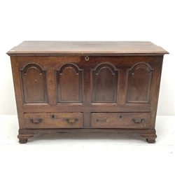 18th century oak mule chest, moulded rectangular hinged top enclosing hinged candle box, four fielded stepped arch panelled front, panelled sides and back, two drawers, on ogee bracket feet, W141cm, H93cm, D57cm