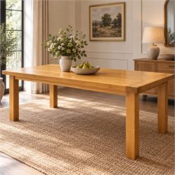 Late 20th century solid light oak dining table, on square supports