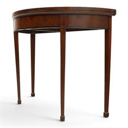 Edwardian mahogany inlaid demi-lune side table, inlaid top with shell motif, green baize interior, with gateleg, raised on square tapering supports terminating in spade feet