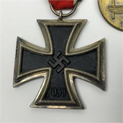 WWII German Iron Cross 2nd Class with ribbon; WWI German Wuerttemberg Medal with ribbon; and Day Badge for 1934 marked Reichsverband Pforzheim32 (3)
