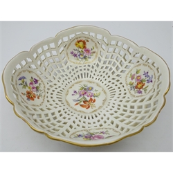  19th century KPM Berlin porcelain basket with five panels hand painted with floral sprays, D19.5cm   