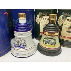 Bells, Scotch whisky, in seven Wade ceramic decanters, including Christmas 1988, 1989, 1990, 1991 etc