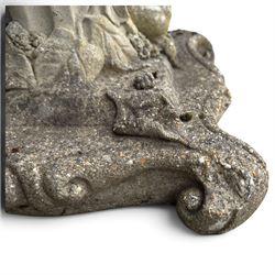 Weathered cast stone birdbath, the kylix shaped bowl with fluted body, raised on a fruiting foliate vine decorated fluted pedestal with upper knop and bird and fieldmouse motifs, shaped square base with scroll feet