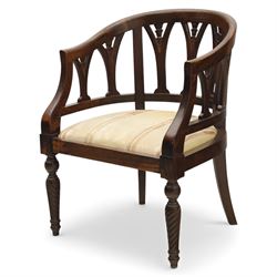 Late 20th century mahogany tub armchair, curved open back with pierced splat supports beneath a rounded top rail, upholstered drop-in seat in patterned fabric, raised on turned and ringed supports