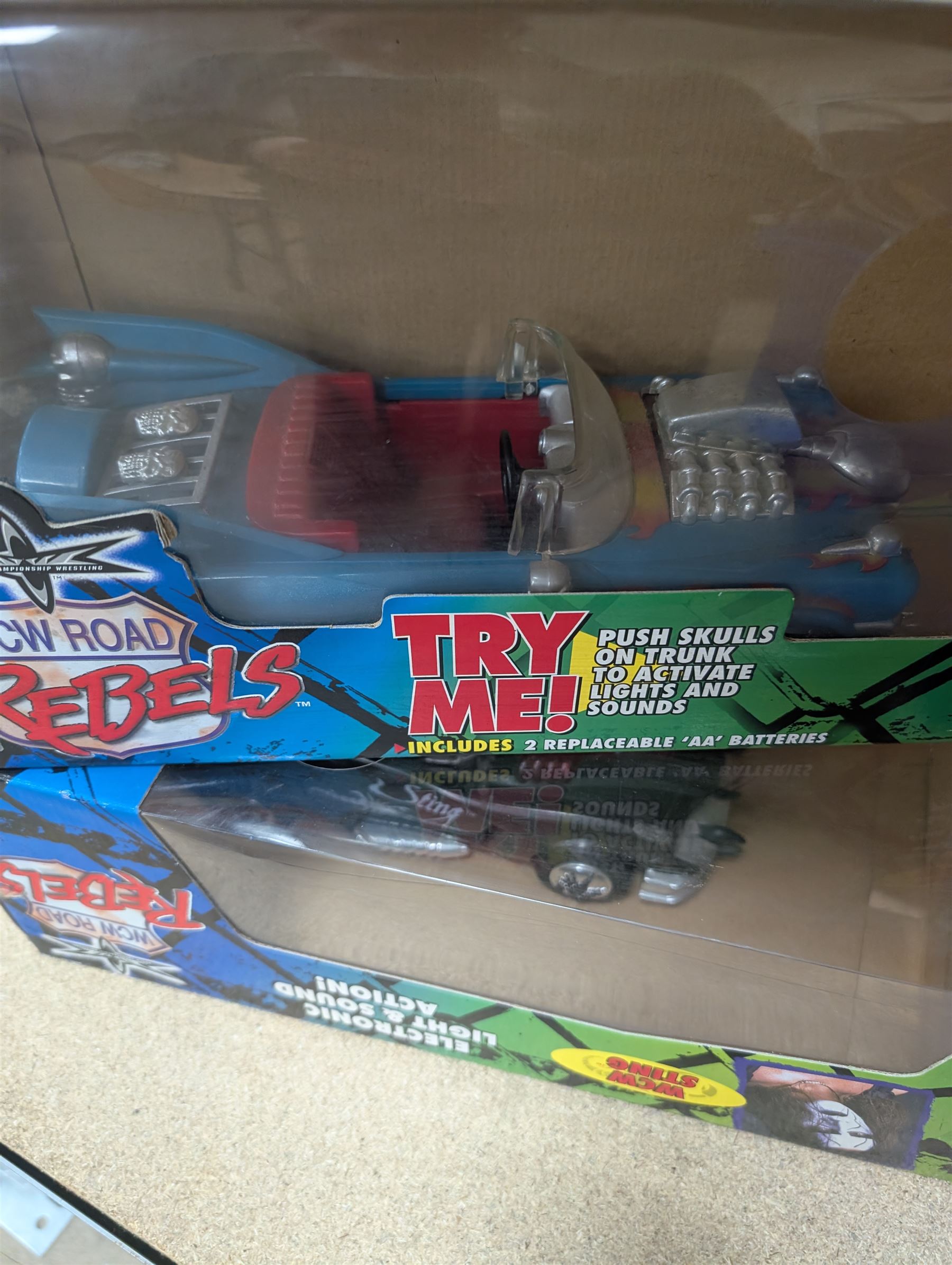 Collection of wrestler figures, two WCW Road Rebels vehicles and a collection of accessories