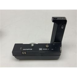 Olympus OM-1 camera body, serial no 913212, with 'Olympus OM-System F.Zuiko Auto-S 1:1.8 f=50mm' lens, serial no.74374, 'Vivitar wide angle MC 28mm 1:2.8 49mm' lens, serial no. 42042268, and Olympus OM winder 2