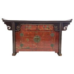 Chinese style Alter side cabinet, fitted with two drawers and cupboard, distressed red lacquered finish, fret work decorated brackets 