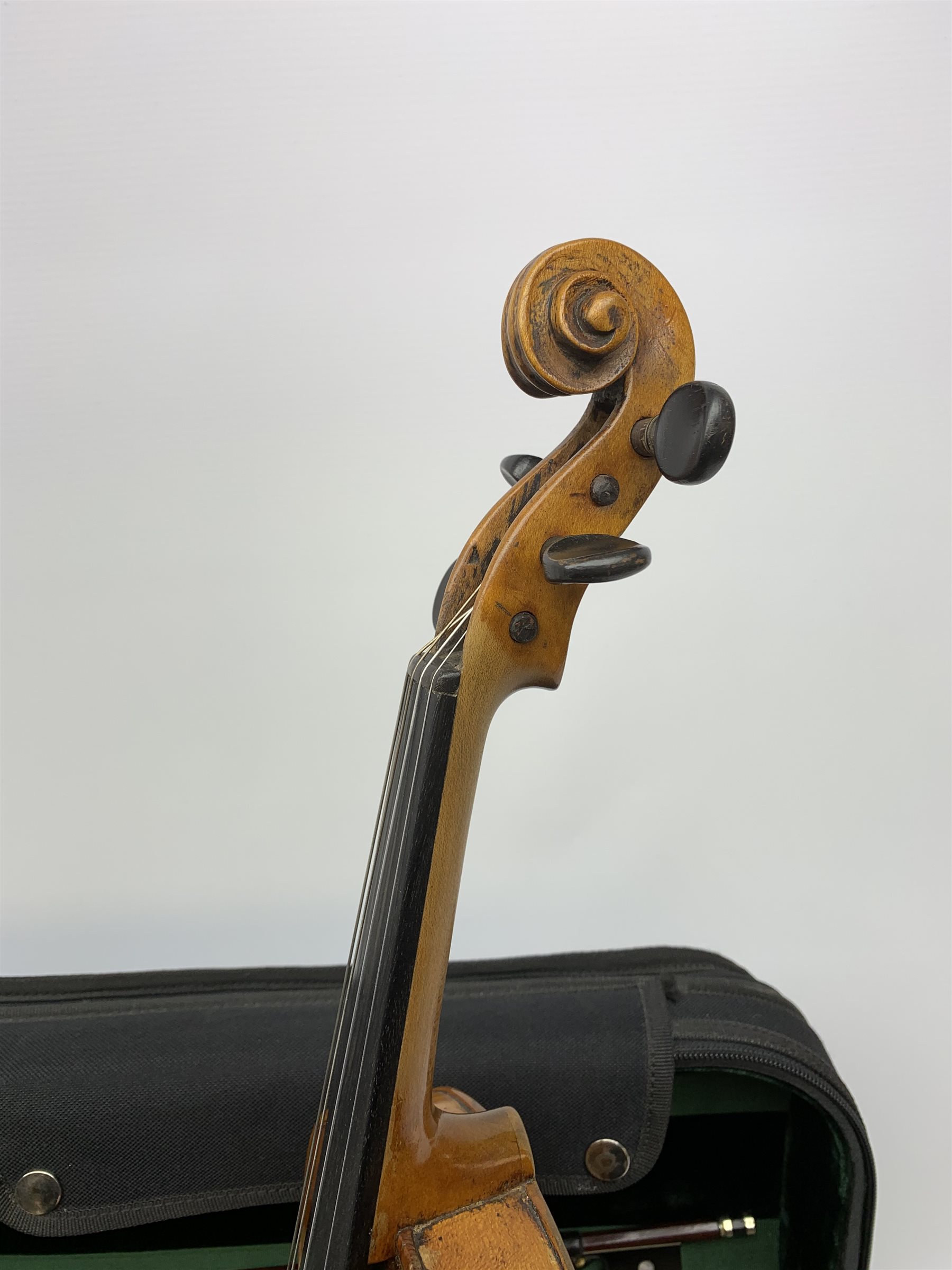 Late 19th century continental violin, possibly Italian, with 36cm two-piece maple back and ribs and spruce top, bears label 'Antonius Stradivarius Anno 1721', 60cm overall; in modern carrying case with silver mounted pernumbuco bow