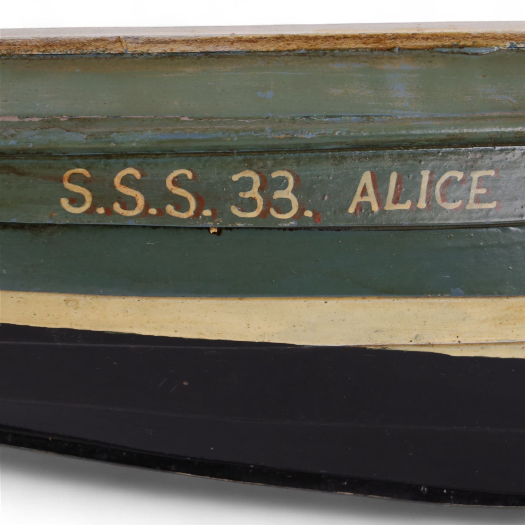 Two wooden fishing coble models, comprising SE31, with rudder, painted in blue, white and red and SSS.33 'Alice', painted in green, black and yellow, largest H16cm, L70cm