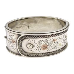 Victorian silver hinged bangle, buckle design with engraved and applied gold decoration by Jackson Brothers, Birmingham 1886