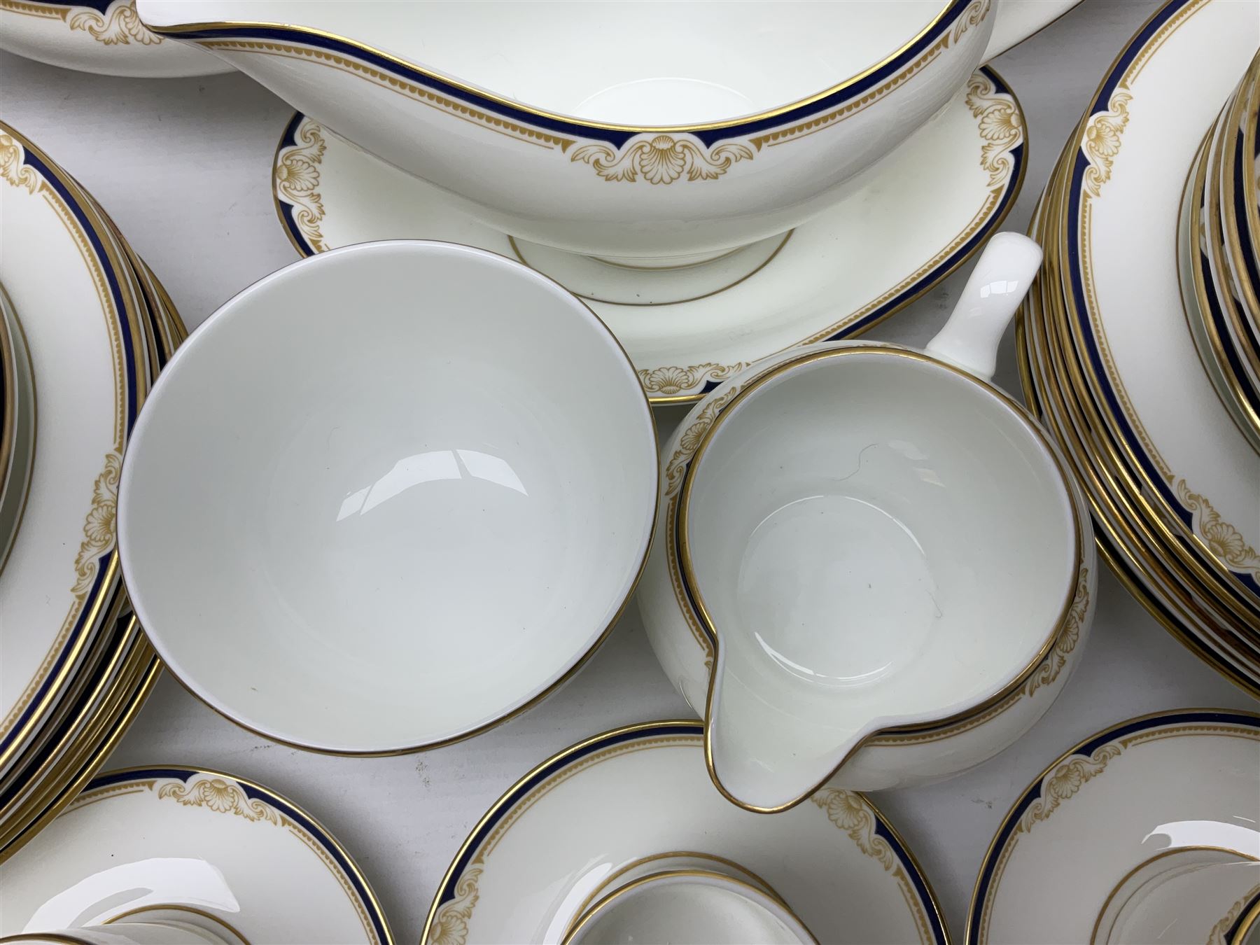 Wedgwood Cavendish pattern dinner service for twelve, comprising dinner plates, side plates, bowls, soup bowls, two tureens, saucer boat and sauce, together with matching part coffee service (82) 