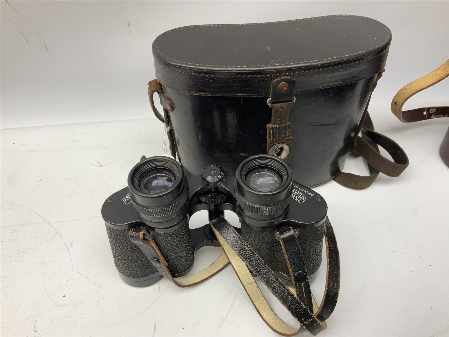 Three pairs of Carl Zeiss Jena binoculars, Jenoptem 10x50W, Jenoptem 8x30W and Jenoptem 10x50, all cased (3)