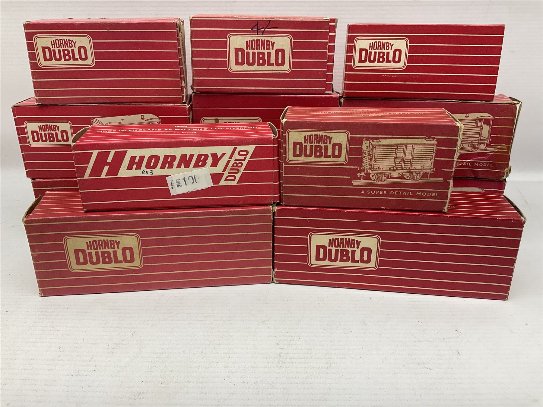 Hornby Dublo - sixteen goods wagons comprising 4644 21-Ton Hopper Wagon, 4315 Horse Box (BR) with horse, 4316 Horse Box (SR) with horse, 4649 Low Sided Wagon with tractor, 4301, 4310, 4311, 4312, 4313, 4320, 4626, 4648, 4652, 4675, 4678 and B550200 (Mineral Wagon); all in red boxes (16)