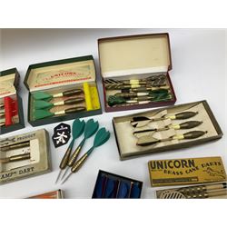 Nineteen sets of dartboard darts by Unicorn, Jim Pike, 'One-o-One', Farebrother etc, with various flights, shafts, styles and weights; predominantly boxed