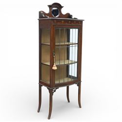 Edwardian inlaid mahogany display cabinet, shaped pediment with central circular mirror pl...
