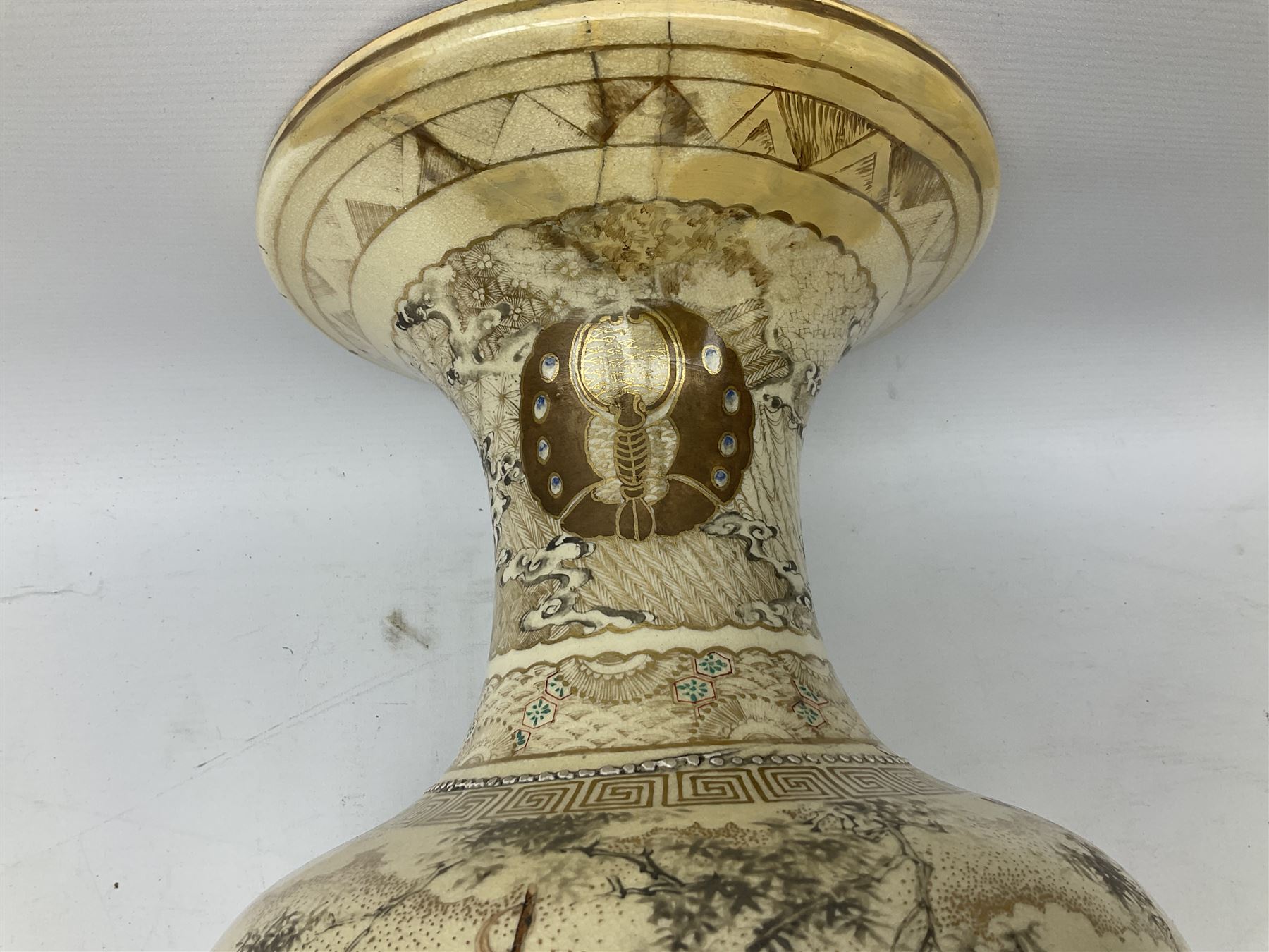 Pair early 20th Century Japanese floor vases of ovoid form, painted with warriors and elders within geometric designs and gilding, H61cm