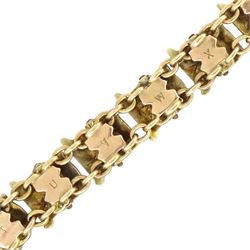Early 20th century rose gold enamel flag bracelet, with engraved alphabet to underside of bracelet, stamped 9ct