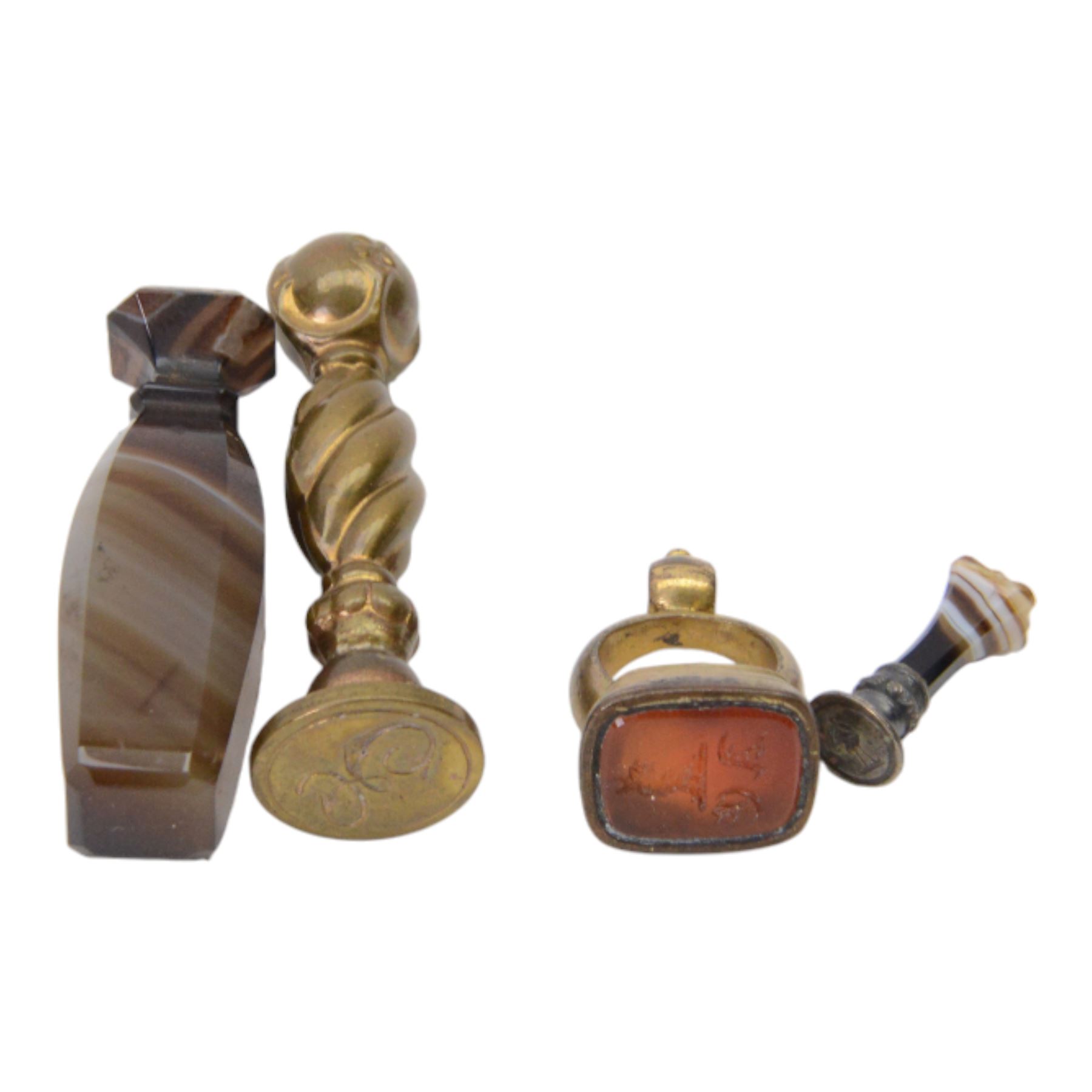 Collection of four 19th century gold plated seals with carnelian matrixes, together with three seals including an agate example, largest seal H3.5cm