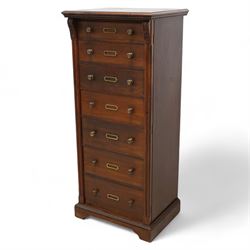Thomas Edwards & Sons (Newcastle 1877-1882) - Victorian walnut Wellington chest, rectangular moulded top over seven graduating drawers, each fitted with brass handles and label holders, flanked by foliate carved brackets over reed-moulded and chamfered uprights, on shaped skirted base
