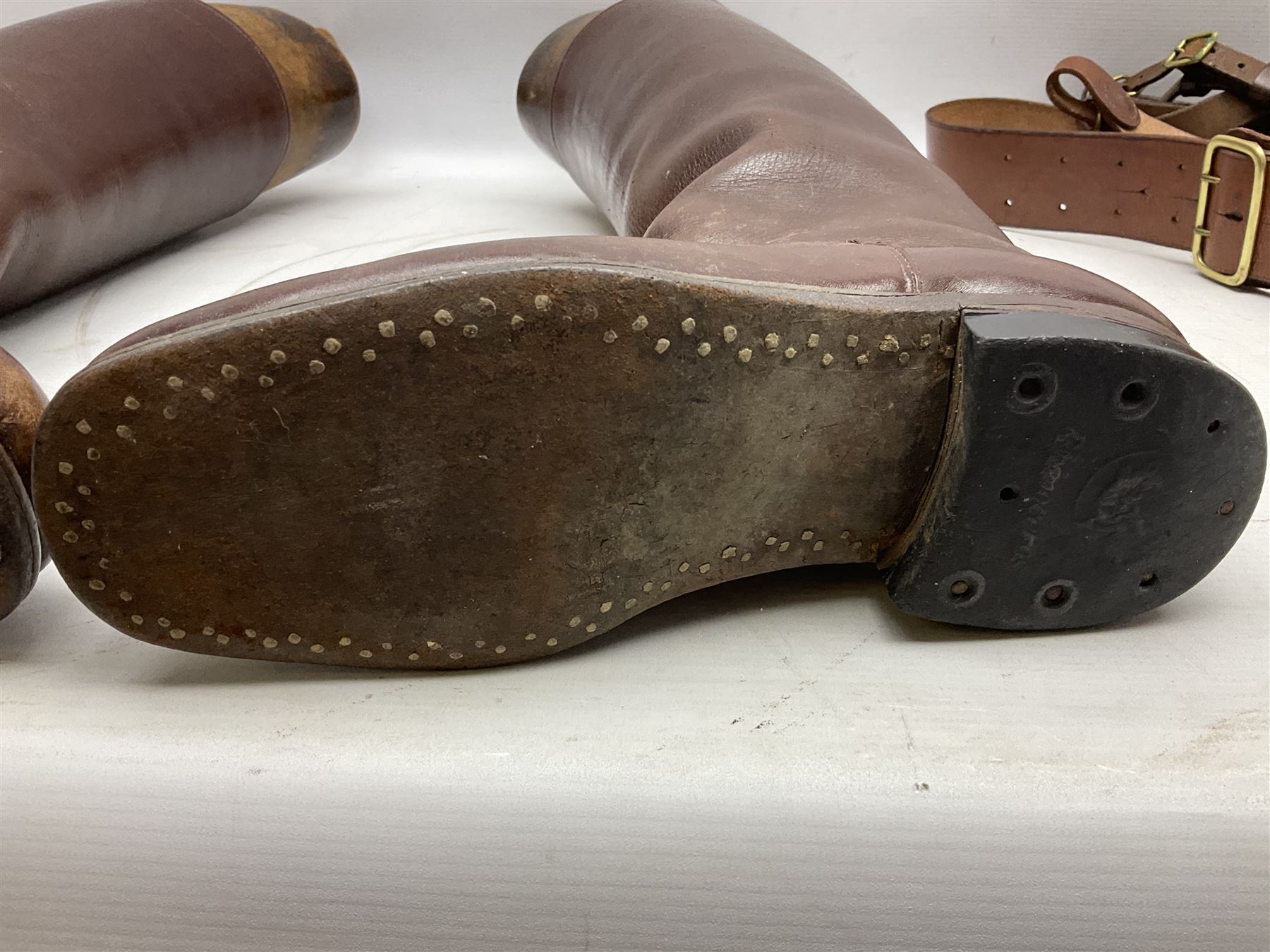 Pair of WW1 style Army Officer's brown leather full leg riding boots with Alkit four-piece wooden boot trees; and two officer's Sam Browne leather belts with cross-straps, one with sword frog (4)