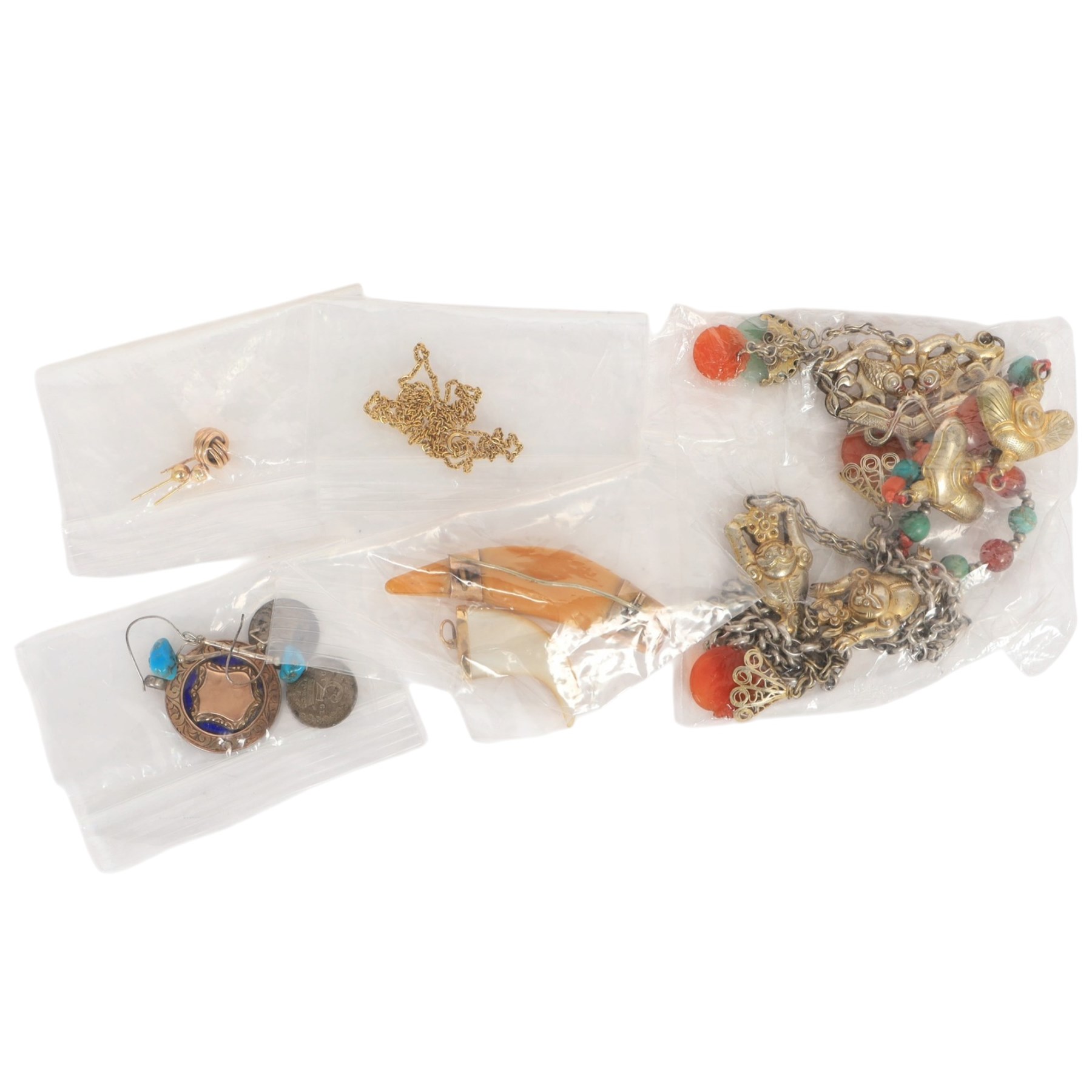 9ct gold jewellery, including resin tooth design brooch, mother of pearl claw design pendant, pair of stud earrings and a single earring, together with an 11ct gold chain, silver jewellery including charm necklace, a collection of costume jewellery and wristwatches