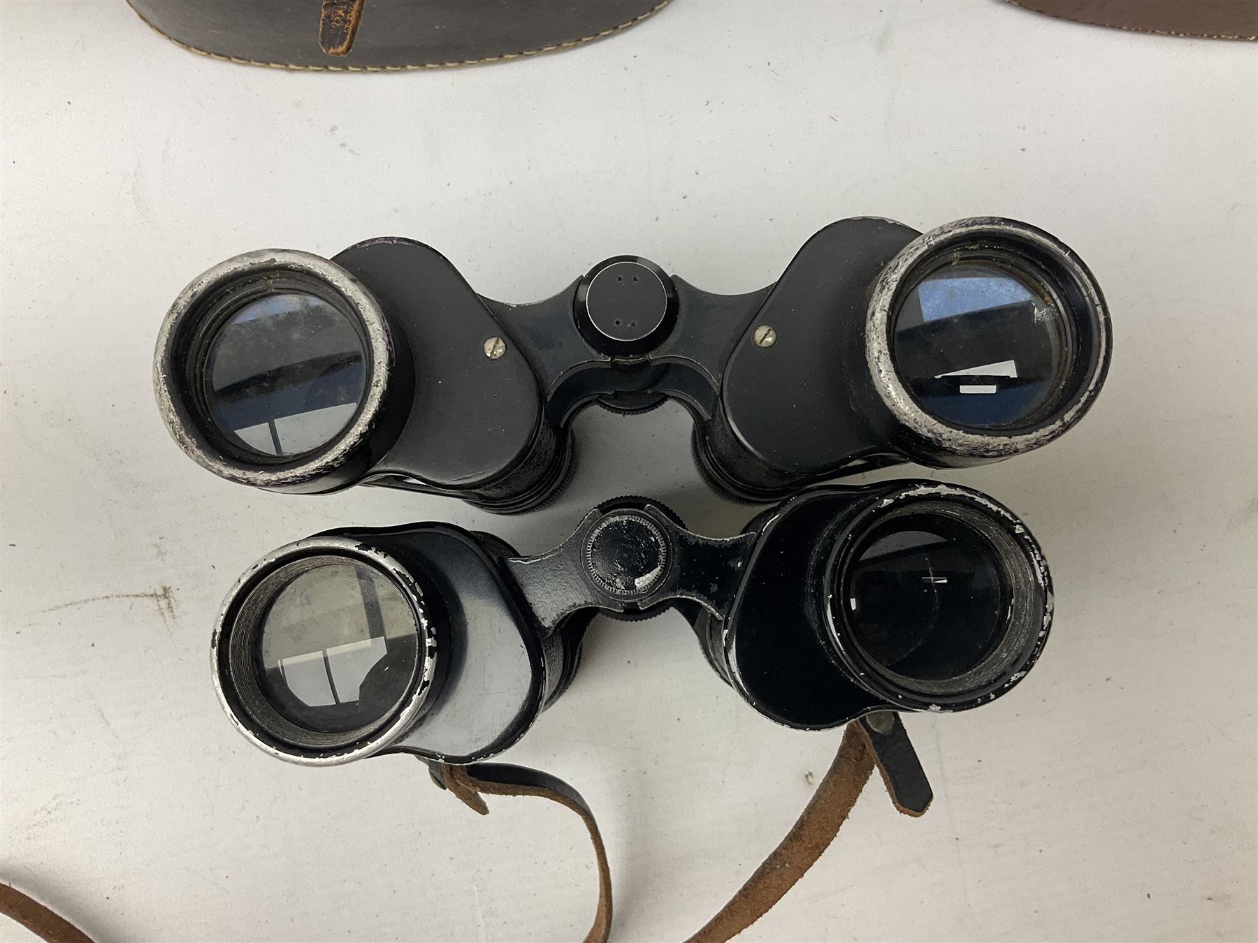 Nine binoculars to include Prinz 10x50, Prinzlux 10x50,  Ellgee Cadet 8x25, Mark Scheffel 35x50 etc, eight with cases