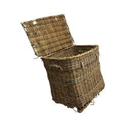 Large wicker basket, metal bound hinged lid, with carrying handles, on baton sledges with metal castors (W91cm, H77cm, D67cm); together with a stool with cane seat (50cm x 38cm, H45cm)