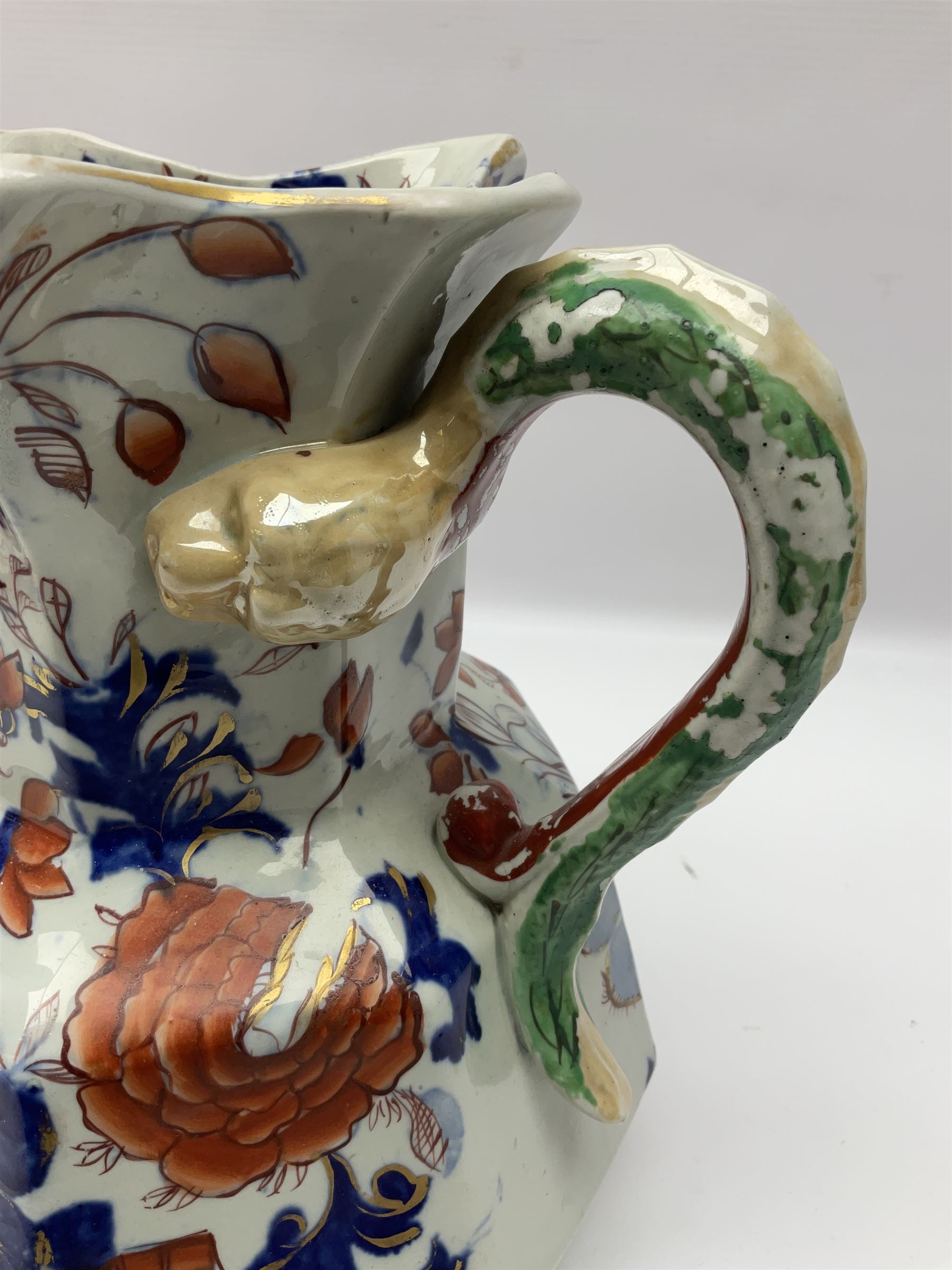 Two Masons Ironstone jugs, each in the Imari palette with serpent handles, with maker's mark beneath, tallest H24cm