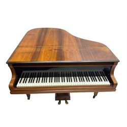  Antonin Petrof - Walnut overstrung baby grand piano, 7 0catve 85 key compass with original strings, tuning pins, damper felts and hammer heads, with roller keyboard action and iron frame, sustaining and una-corda pedals, sliding open lattice music desk, supported on square tapering legs with brass cups and castors, with inner ebonised key fall and ivorine label inscribed 'Supplied by Harrods, London'.