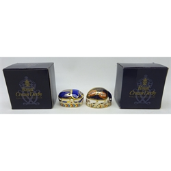  Two Royal Crown Derby paperweights, 'blue ladybird' and 'paptim', boxed, with gold stoppers  
