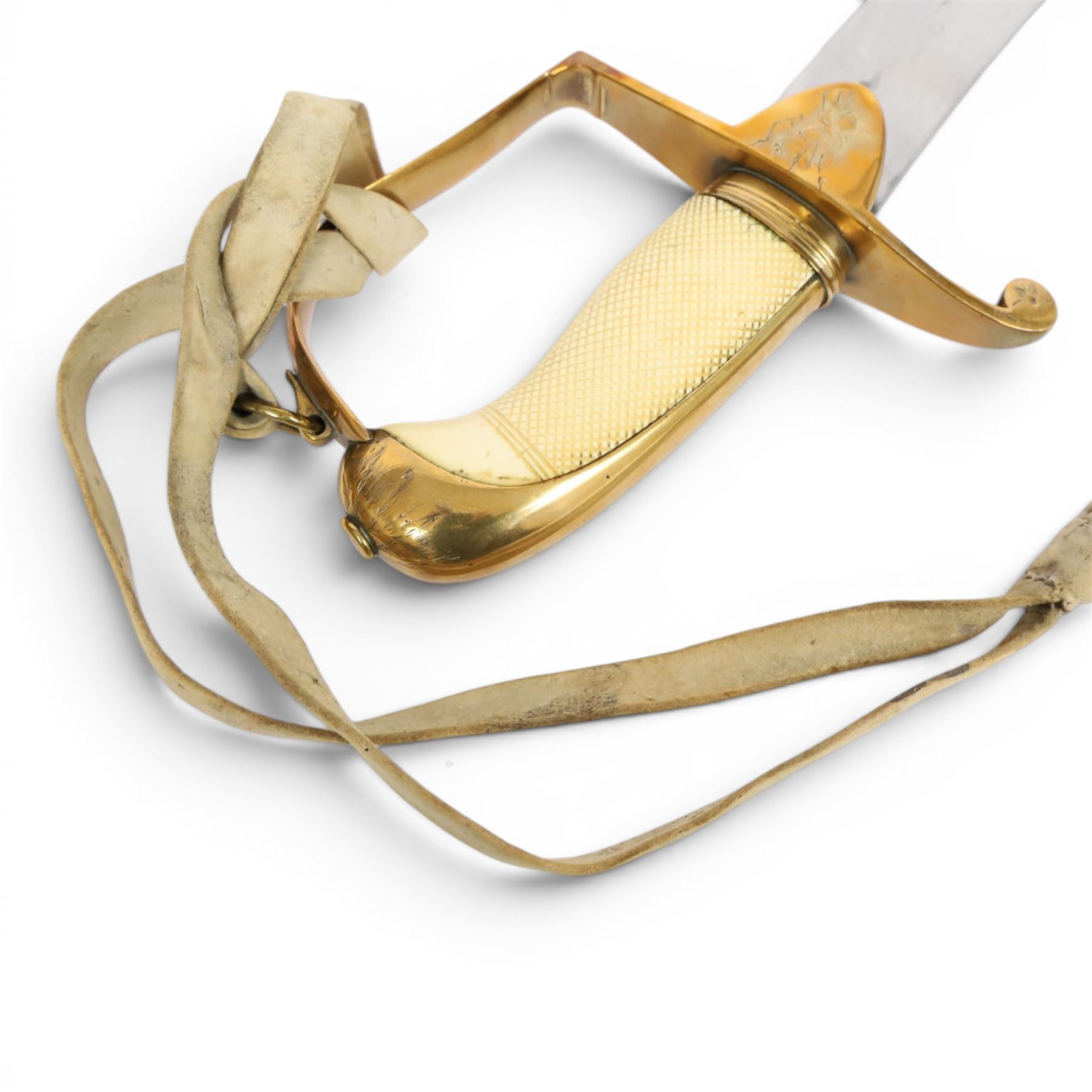 British 1976 pattern cavalry officers' saber variation of  private purchase, the 76cm single edged blade extremely curved, brass stirrup hilt with chequered ivory grip the languets bearing military trophies, with original buck skin sword knot, the leather scabbard has three brass mounts with twin suspension rings, the top mount bears makers cartouche of 'Tatham to his Majesty, Charing Cross London', 1800-1860, overall L90cm  This item has been registered for sale under Section 10 of the APHA Ivory Act 