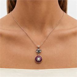 Gold and silver ruby and diamond pendant, single round brilliant cut diamond, surrounded by calibre cut rubies and round brilliant cut diamonds, suspending from a fancy pendant set with further diamonds, on a rose gold plated silver chain necklace, total diamond weight approx 0.30 carat, total ruby weight approx 0.30 carat
