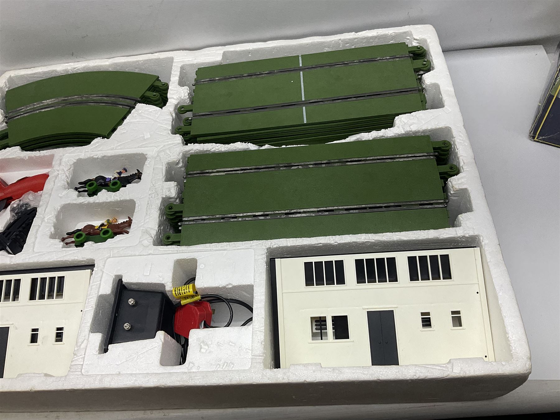 Scalextric - Newmarket racing set including track, two slot horses, two controllers, power unit/cables, accessories and instructions; boxed