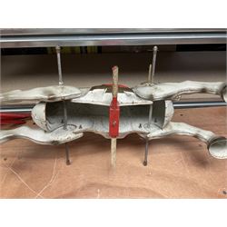 1960's Mobo Toys (David Sebel & Co) Prairie King spring rocking horse on stand, painted pressed steel construction, red tubular stand, trademark red and yellow circular Mobo logo, 100cm long (dismantled)