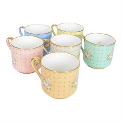 Spode six coffee cups and saucers cased set, decorated with floral sprigs on a polka dot ground with gilt detail