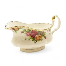 Royal Albert Country Roses tea and dinner service, teapot, milk jug, covered sucrier, eight dinner plates, eight teacups and saucers 