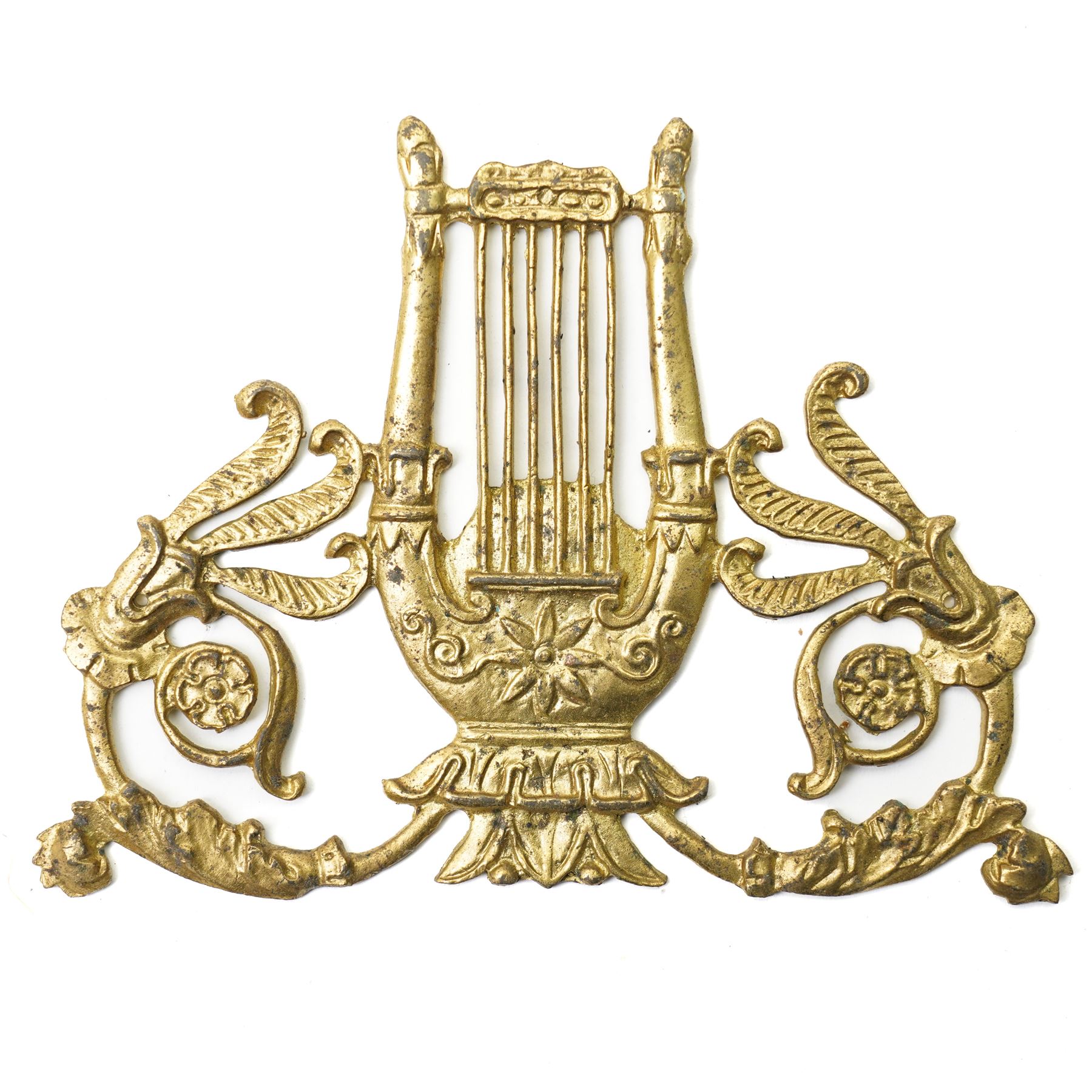 Set of eight brass cabinet door plates formed as lyres marked 'H.V' 9.5cm x 12cm, seven brass cabinet door handles of leaf design, various other handles, boss and a two branch wall light 
Provenance: property of a Nobleman