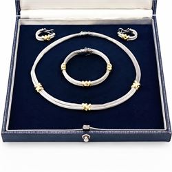 Silver and 18ct gold necklace, bracelet and earrings, two rows of silver mesh, spaced by gold cross motifs, retailed by Mappin & Webb, boxed