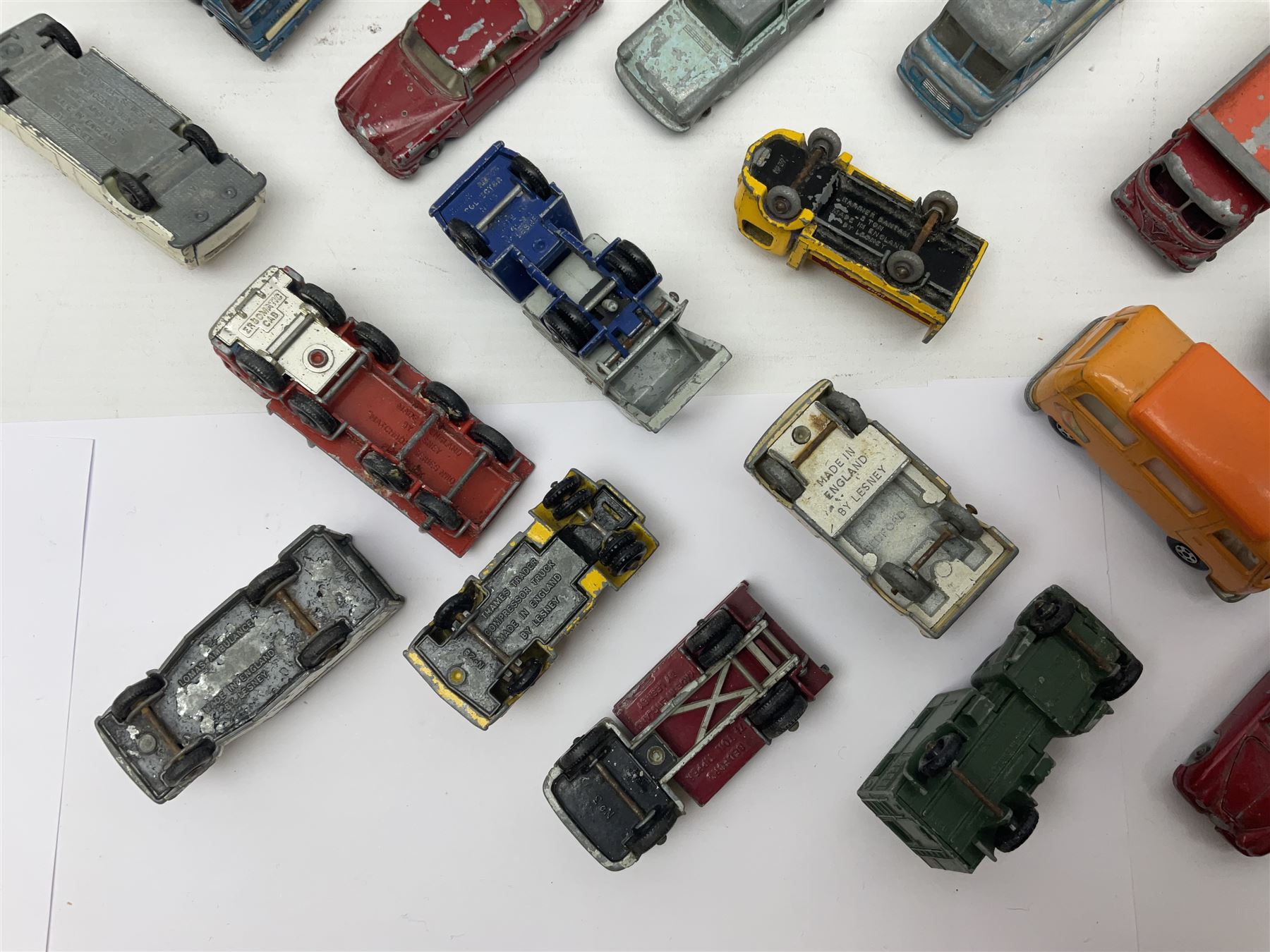 Lesney - approximately forty nine unboxed and playworn die-cast models of various scales with examples from the ‘Matchbox Series’ such as Mercedes Truck No.1, Mercedes Benz ‘Binz’ Ambulance No.2, Stake Truck No.4 etc; further models to include ‘Models of Yesteryear’ 1910 Benz Limousine Y-3, Bedford 7 1/2 Ton Tipper Van No.2, Ford Anglia No. 7 etc 