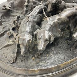 After Pierre Jules Mene, Mounted Huntsman and Hounds, bronze, modelled as a French huntsman on horseback leading five hounds, upon a naturalistic oval base, signed and dated P J Mêne 1869, H65cm