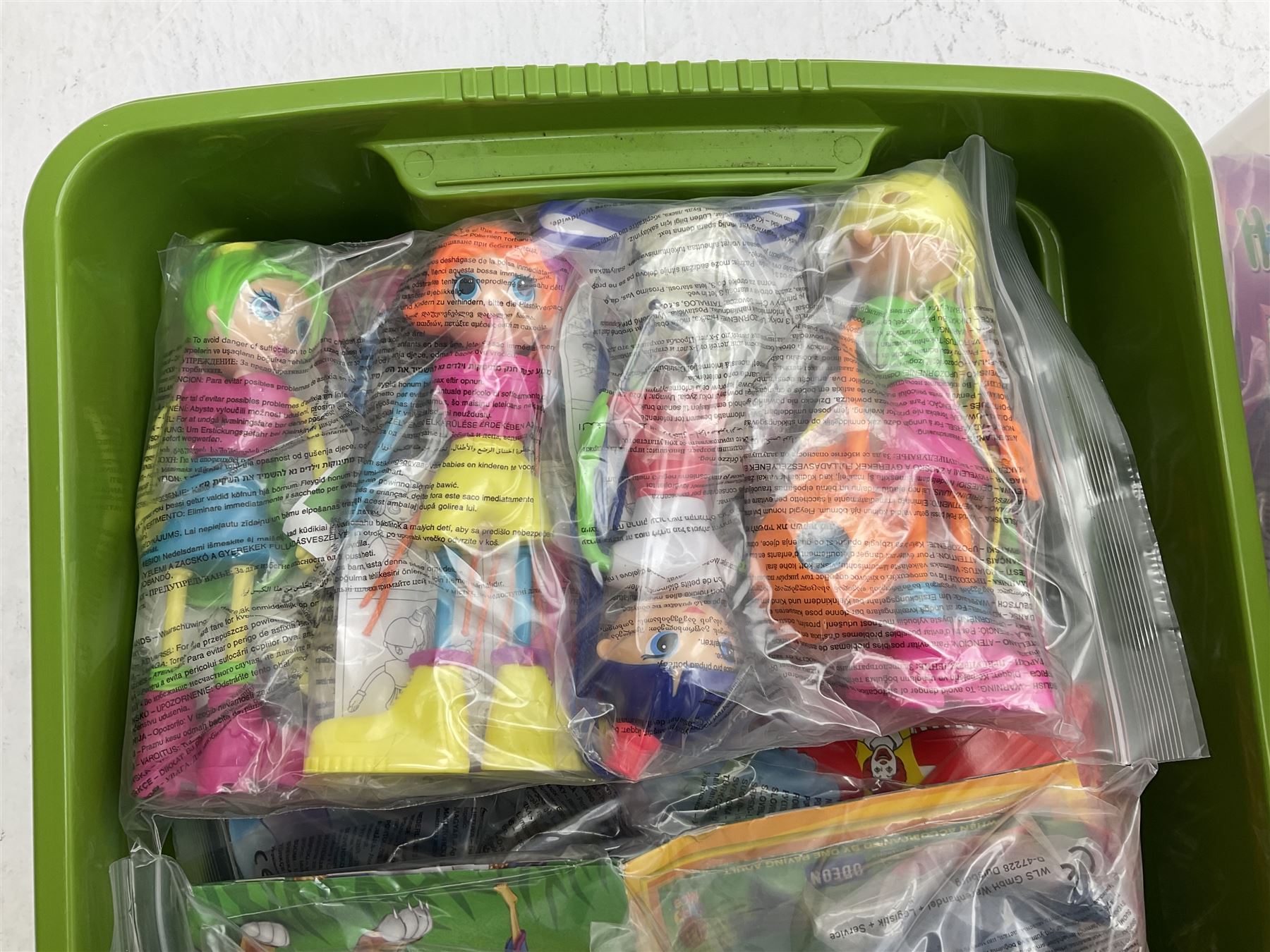 Large quantity of Mcdonalds toys in three boxes