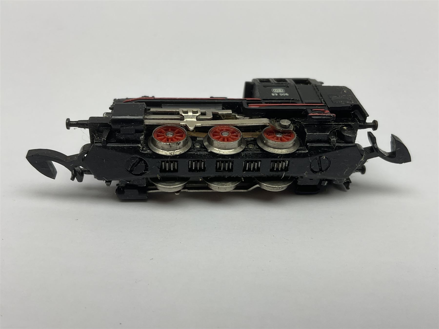 Marklin mini-club 'Z' gauge - DB Diesel Co-Co type locomotive; DB 0-6-0 Rangierlok type shuttle locomotive probably no.8864; and another DB 0-6-0 locomotive probably no.8800; together with an unmarked DB 4-6-2 tender locomotive and DB 2-6-0 tender locomotive; all unboxed (5)